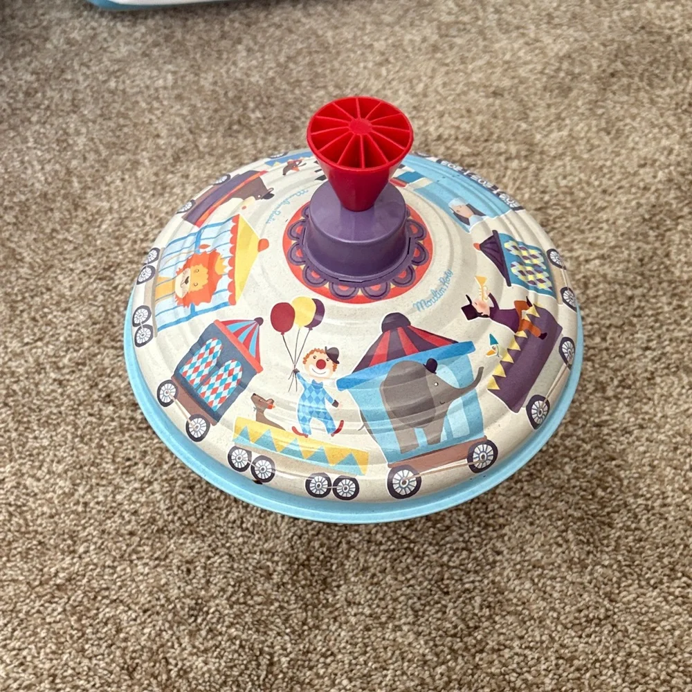 Moulin roty toddler Carnival Print Spinning Top Toy slighlty broken still works